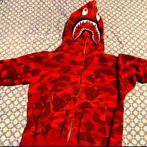 Red bape shark hoodie full zip price is (600) (normal wear) size is (large) Mean